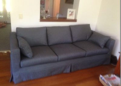 Slip cover on sofa in Manly